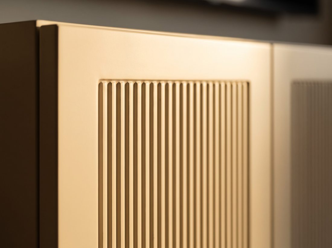 Silky matte cream fluted lacquer cabinet door finish — close-up detail